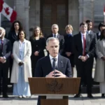 MARK CARNEY